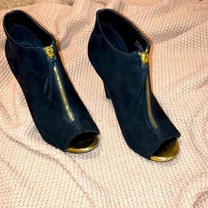 Black and Gold zip up heals